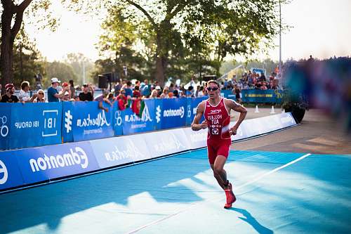 people man in red tank top running human