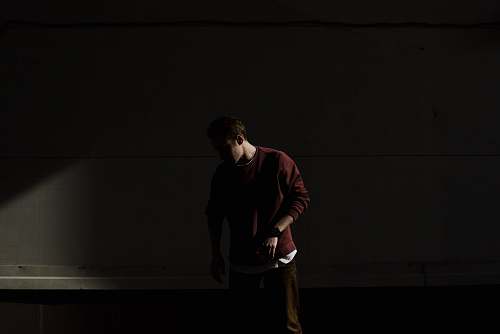 human man looking at the floor people
