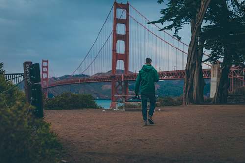 human man standing in front tree people