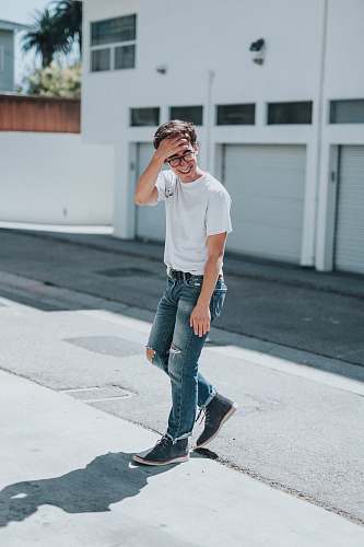 flora man standing on concrete pavement jar