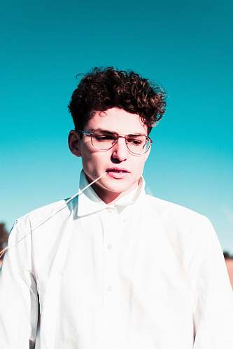 human man standing wearing eyeglasses people