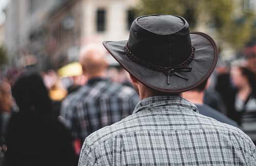 people man wearing black cowboy hat hat