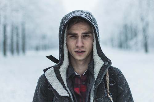 people man wearing black zip-up hooded jacket human