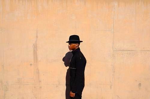 people minimalist photography of man facing to the side human