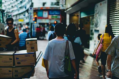people people walking on street during daytime human