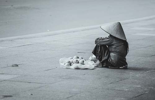 people person sitting beside street human