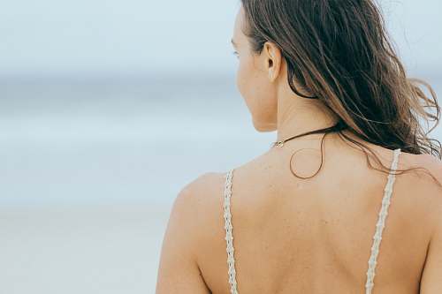 human person taking photo of women's back people