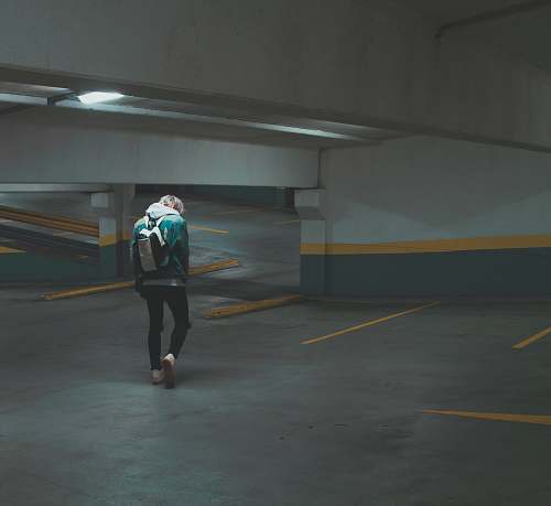 human person walking on underground parking area people