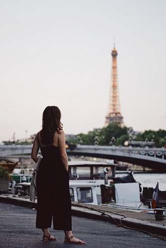 people selective focus photography of a woman in black jumpsuit human
