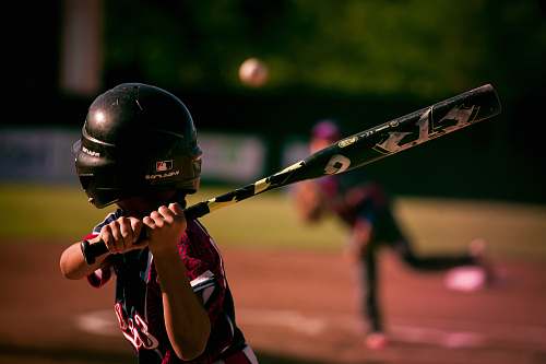 people selective focus photography of person holding baseball bat human