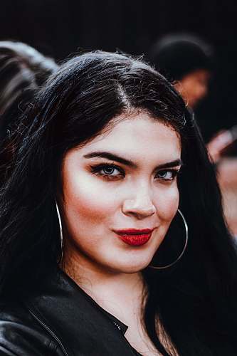 human smiling woman taking photo people