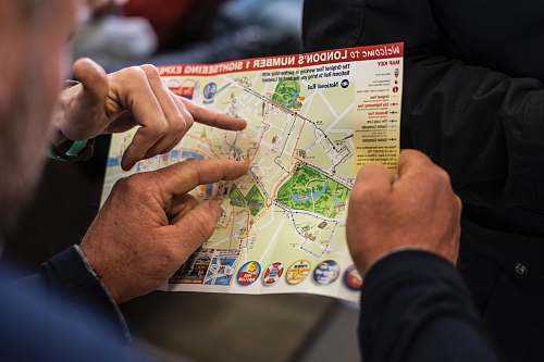 people two people pointing at London's number one sightseeing map human