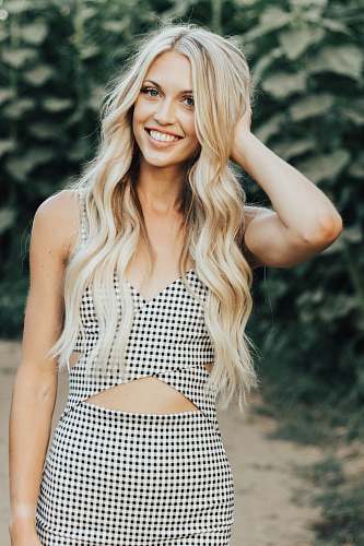 people unknown celebrity holding her hair using right hand human