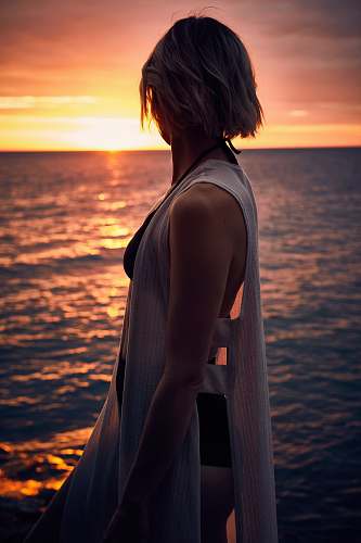 human woman facing sideways at sunset people