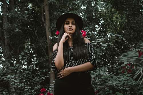human woman in black and white striped off-shoulder shirt people