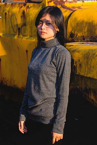 human woman in black long-sleeved tee shirt people