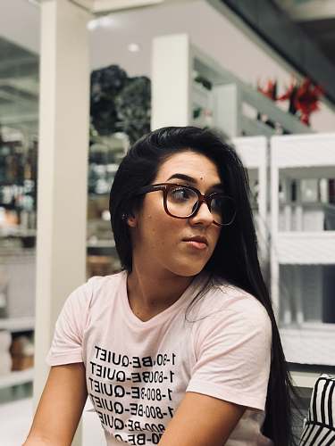 human woman in white v-neck t-shirt and eyeglasses people