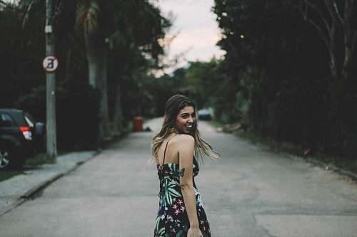 human woman looking over shoulder people