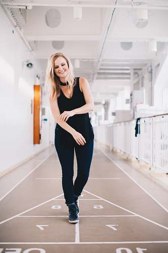 human woman playing floor game on corridor people