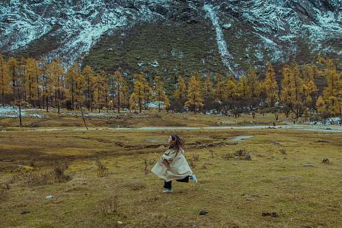 human woman running on green grass people