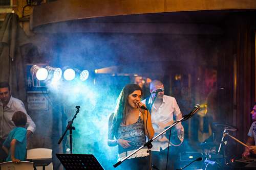 people woman singing on stage human