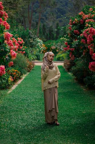 people woman standing on green grass human