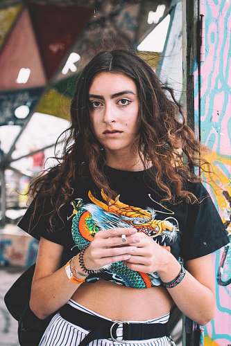human woman standing with cigarette on hands people
