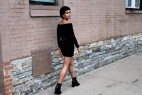 people woman walking near wall human