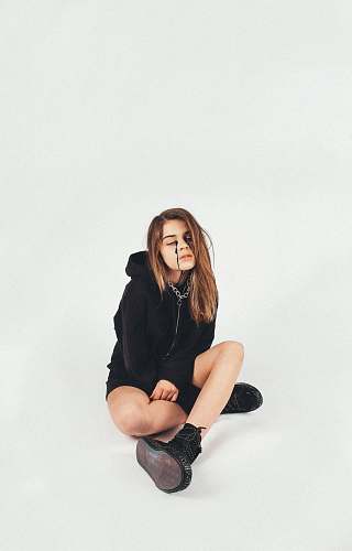 human woman wearing black pullover hoodie people