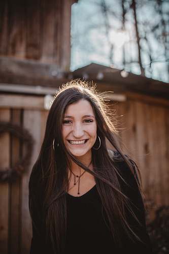 human woman wearing black shirt smiling photography people