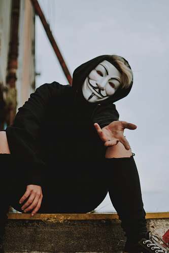 clothing person wearing Guy Fawkes mask sleeve