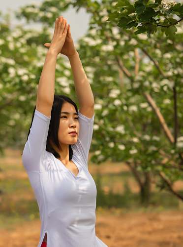 human woman doing yoga person