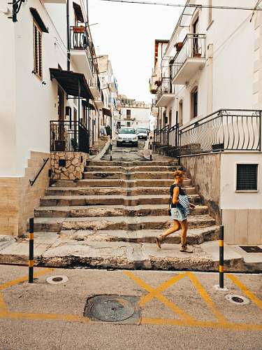 shorts woman walking on pathway clothing