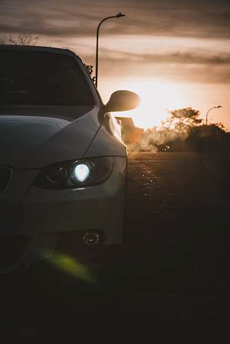 transportation white car parked on road car