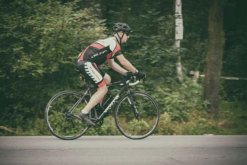 bike cyclist riding bicycle on road transportation