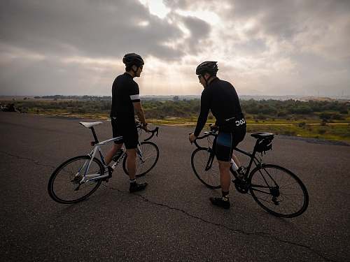 bicycle two cyclist on road transportation