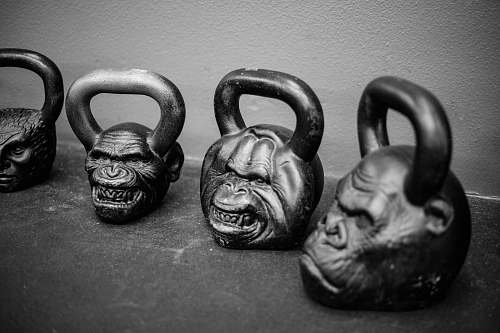 grey four apes kettlebells on pavement kirkfit gym