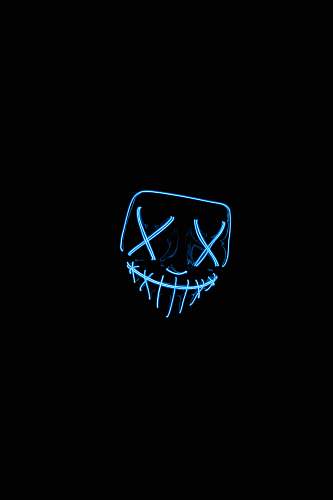 hand yellow neon light inside dark room halloween