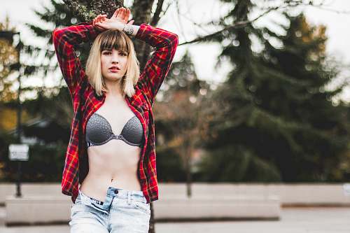 person woman unbuttonted top human