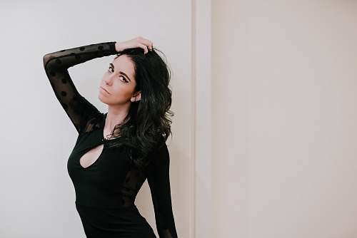 sleeve woman wearing black long-sleeved dress long sleeve