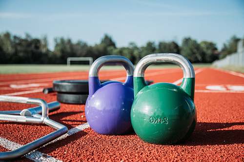 electronics two green and purple kettlebells hardware