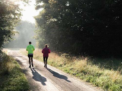 person two person jogging during daytime human