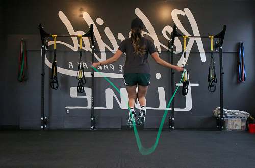 human woman using jumping rope person