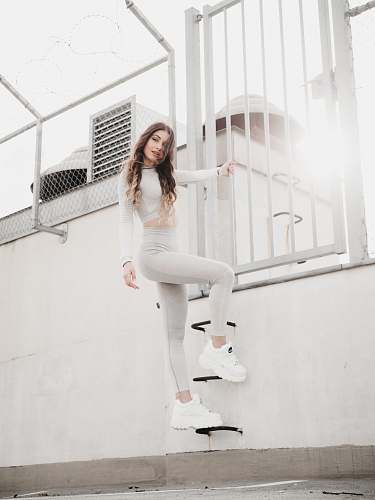 clothing woman in white crop top holding white rail apparel