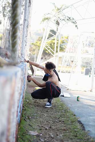 person man bundling wall exercise