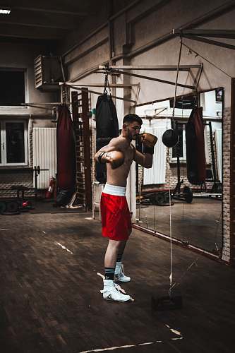 person man wearing red shorts inside gym sport