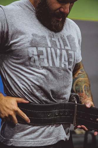 people man wearing weight lifting belt person