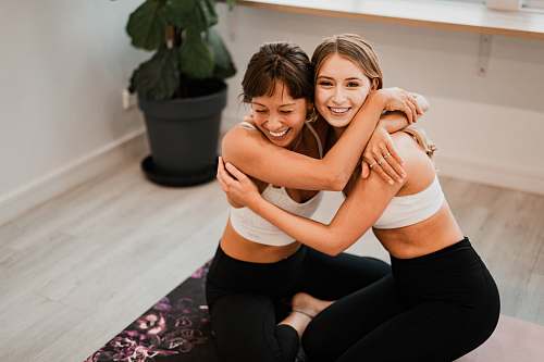 person shallow focus photo of white sports bra face