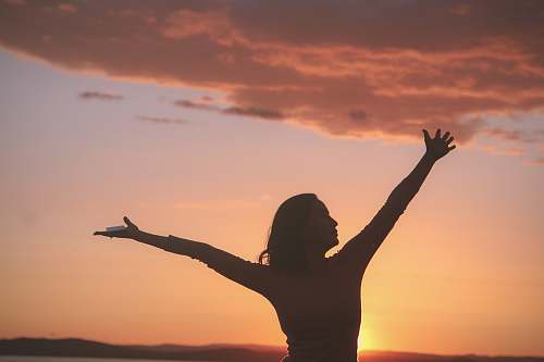 person silhouette of woman worship
