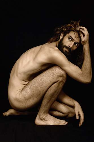 person topless man posing for photo face